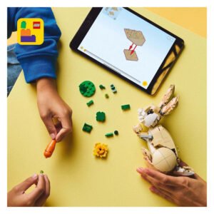 Kinderen bouwen LEGO Creator speelgoeddieren met instructies op tablet