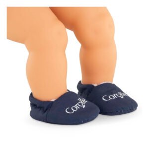 Corolle pop met marineblauwe slofjes aan de voeten