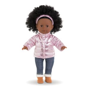 Donkere Corolle pop met roze glanzend jasje, jeans en laarsjes
