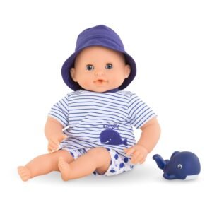 Zittende Corolle badpop Marin met blauw walvisje
