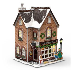 Zijaanzicht 3D puzzel De Klompenmakerij met sneeuwdak en kerstkransen