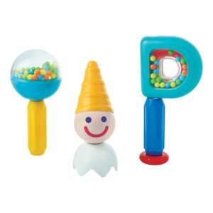 Drie Stick-O speelgoedfiguren met felgekleurde handgrepen en kralen
