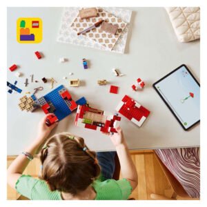 Bovenaanzicht van LEGO Minecraft bouwproces met tablet