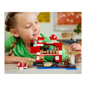 Meisje bouwt LEGO Minecraft set met figuren en dieren