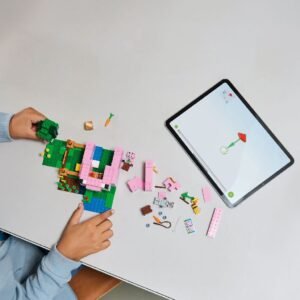 LEGO Minecraft bouwset in aanbouw naast een tablet met digitale instructies
