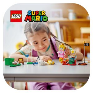 Meisje bouwt met LEGO Super Mario Princess Peach set met speelelementen en vlag