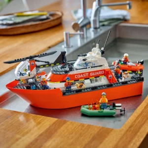 LEGO City reddingsboot vol bemanning en accessoires in gootsteen