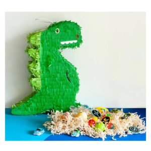groene dinosaurus pinata met speelgoed en confetti op tafel