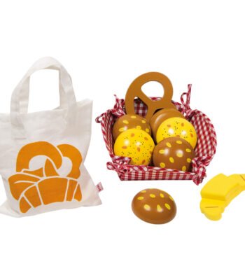 Canvas tas met croissant print naast houten speelgoed ontbijtset met broodjes en eieren in mandje Goki Ontbijtmand