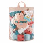 Doorzichtige opbergzak met roze handgreep gevuld met grote bouwblokken voor peuters in pastelkleuren Ecoiffier bb Abrick Bouwblokken