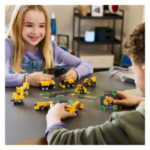 Kinderen spelen met LEGO Technic Machtige Machines bouwvoertuigen en verzamelkaarten